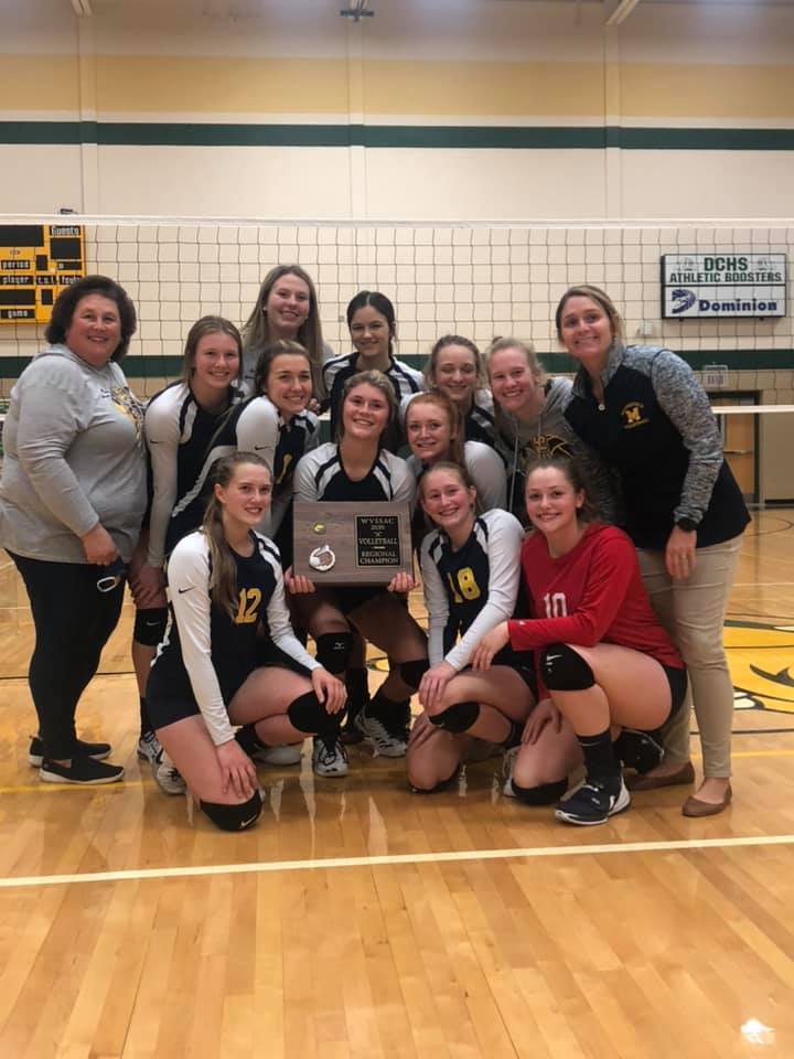 Middle School Volleyball Team holding State Tournament Plaque