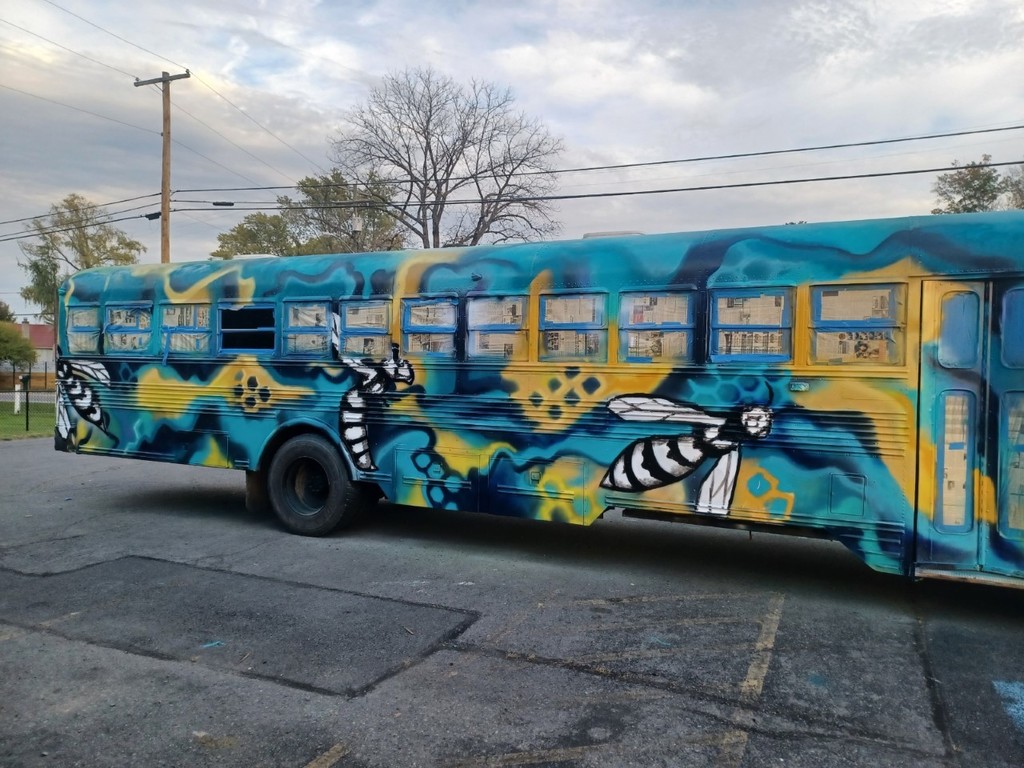 school bus, painted, learning center, bee, blue, yellow